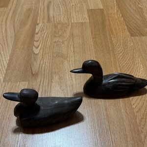 Iron wood carved ducks